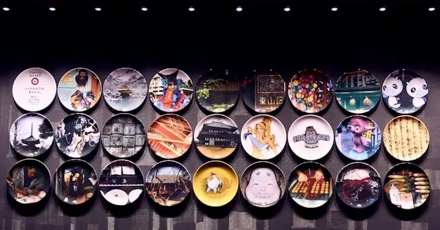 plates displayed on a wall for how to display patches