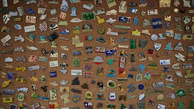 a cork board full of patches for how to display patches