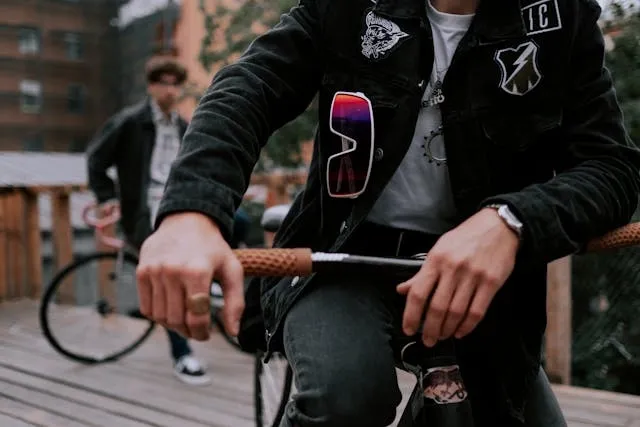 a person wearing a black jacket with patches for best jacket for patches a person wearing a black jacket with patches for best jacket for patches