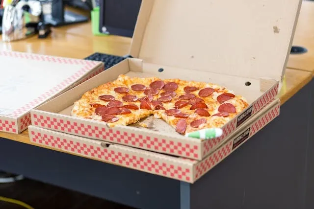 pizza in a box on a table for can you put a pizza box in the oven pizza in a box on a table for can you put a pizza box in the oven