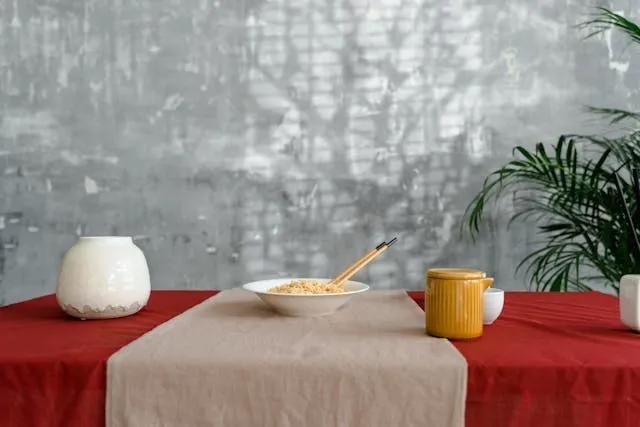 a bowl of past on a table for how to use a table runner a bowl of past on a table for how to use a table runner