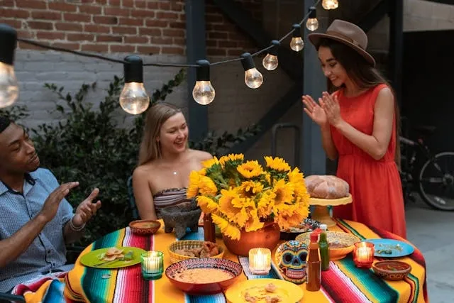 people at an outdoor dining table for mexican table decorations people at an outdoor dining table for mexican table decorations