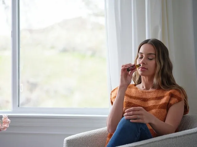 a woman using essential oils for how to air fresheners work a woman using essential oils for how to air fresheners work