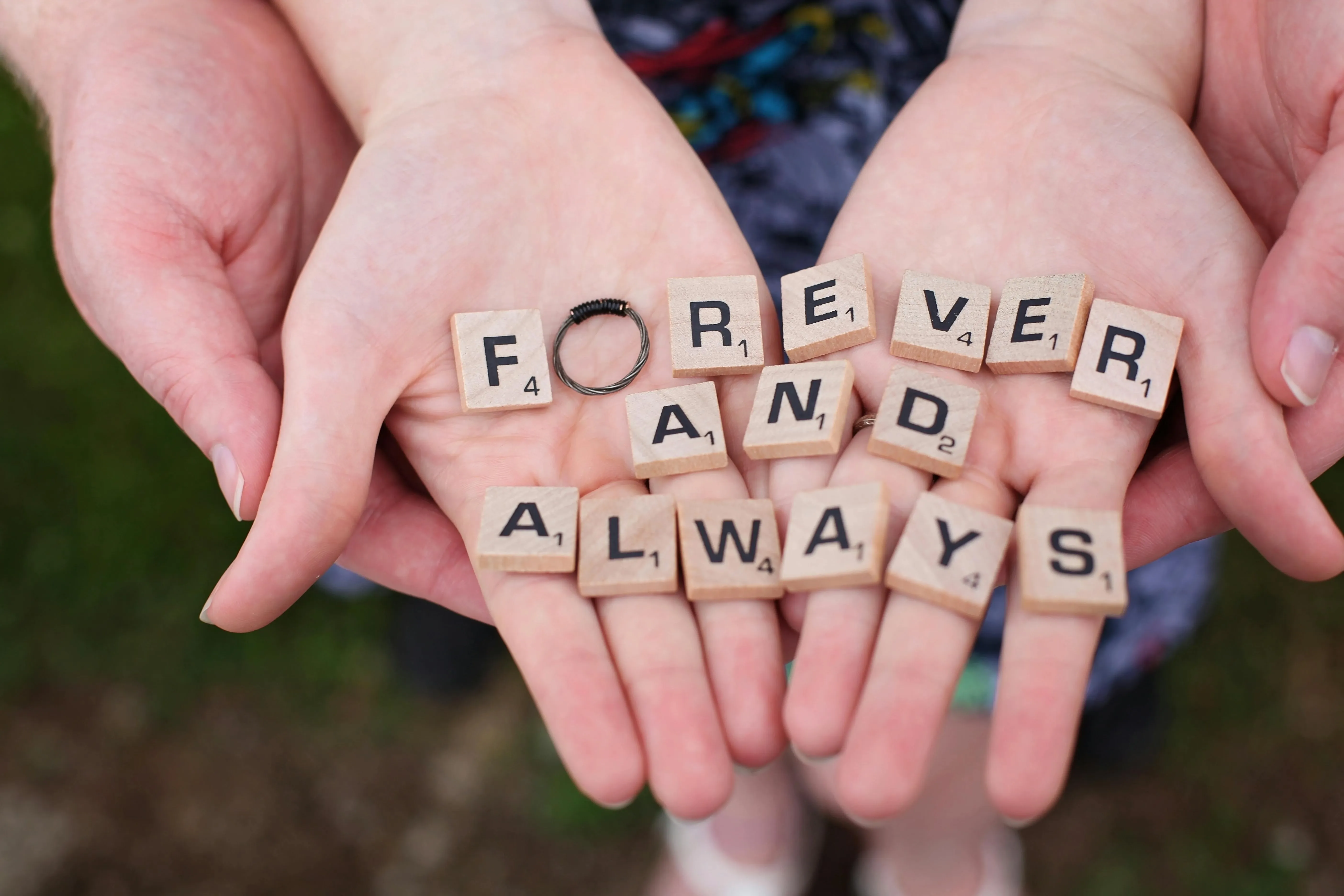 scrabble tiles on a person’s hands for engagement party ideas scrabble tiles on a person’s hands for engagement party ideas