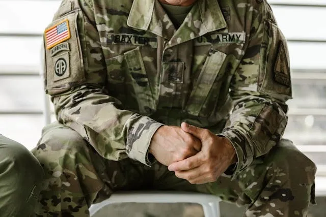 a man in military apparel for types of patches a man in military apparel for types of patches