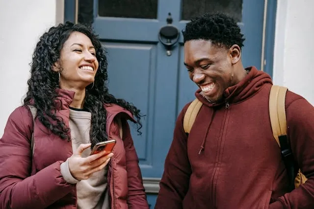 a man and woman laughing together for best everyday backpack a man and woman laughing together for best everyday backpack