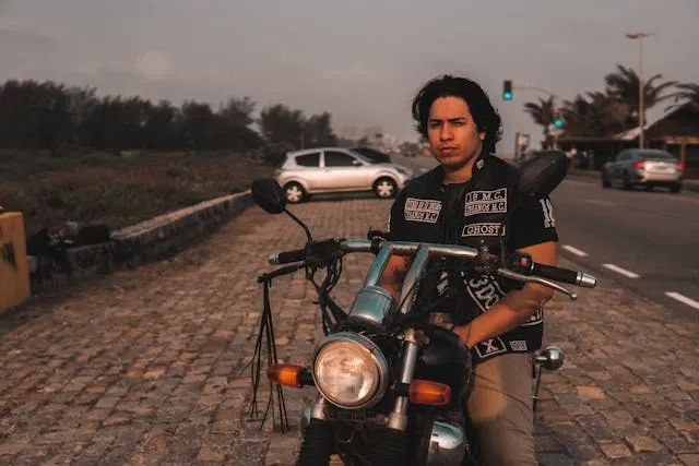 a motorcycle club member on his motorbike for types of patches a motorcycle club member on his motorbike for types of patches
