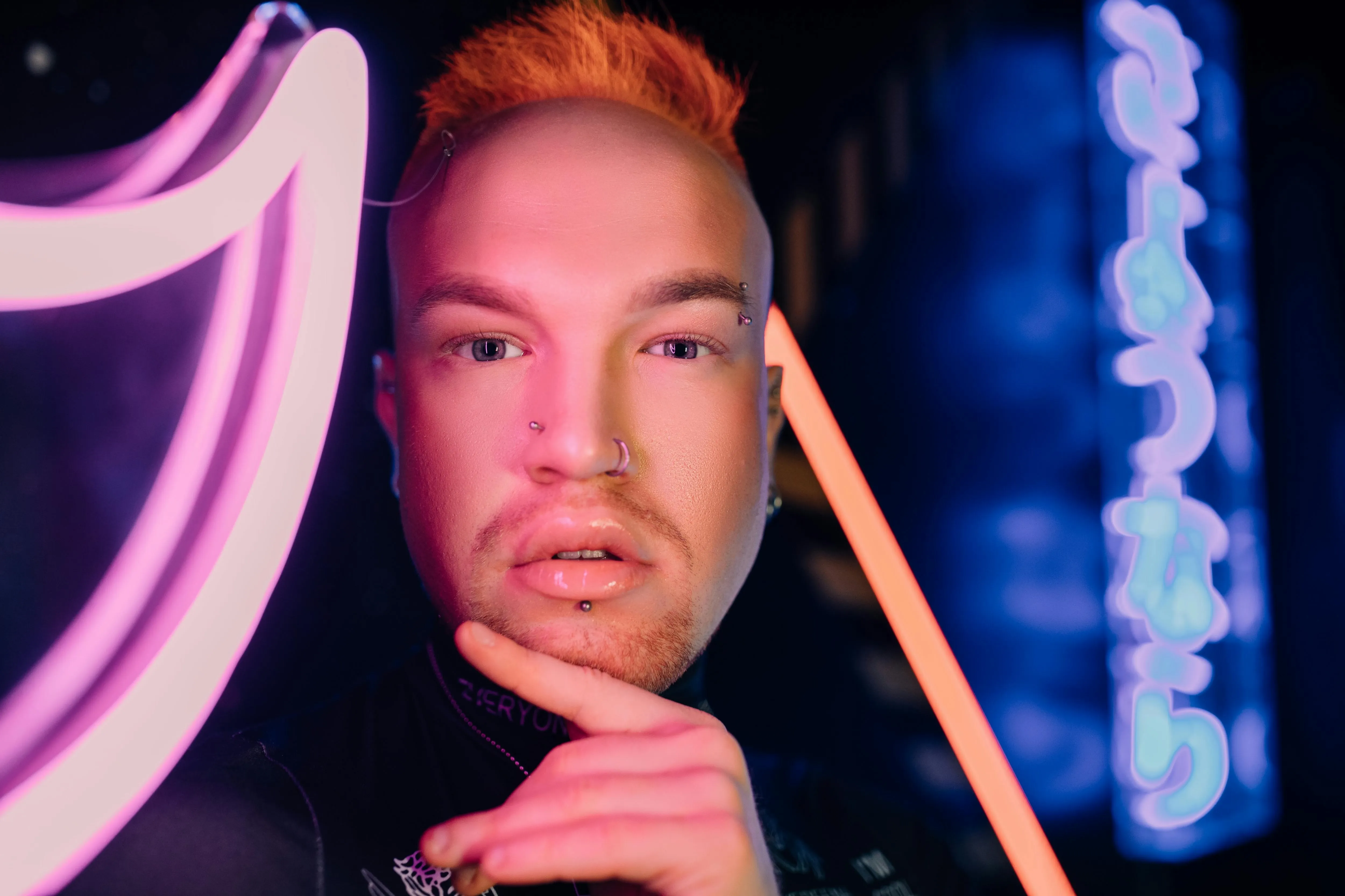 close-up of a man with piercings for neon light portraits close-up of a man with piercings for neon light portraits