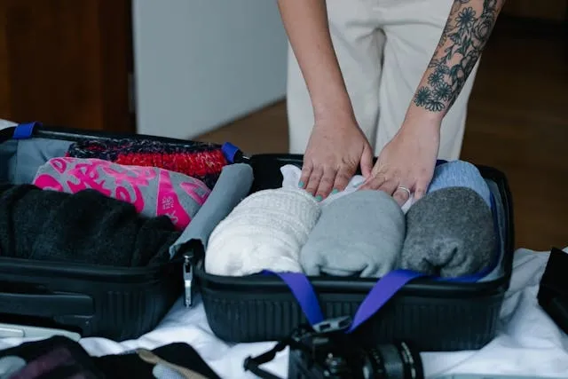 a person packing their bags for can a duffel bag be a carry-on a person packing their bags for can a duffel bag be a carry-on