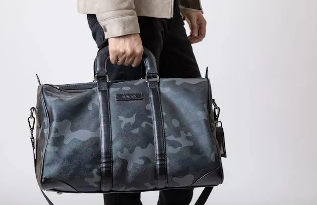 close-up of a man carrying a bag for can a duffel bag be a carry-on close-up of a man carrying a bag for can a duffel bag be a carry-on
