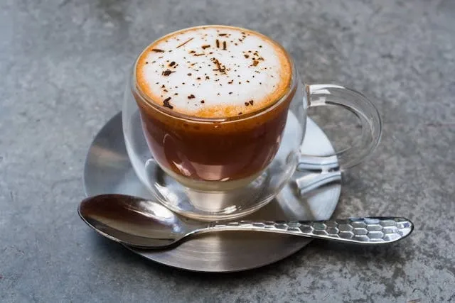 a frappuccino in a clear glass cup for best glass coffee mugs