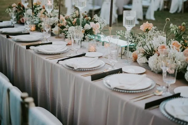 a photo of a luxurious table setting for what is oblong tablecloth