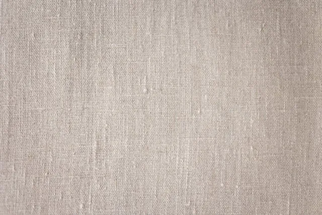 close-up of a textured fabric for drop cloth tablecloth close-up of a textured fabric for drop cloth tablecloth