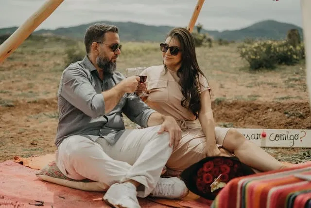 a couple having a picnic for simple proposal ideas a couple having a picnic for simple proposal ideas