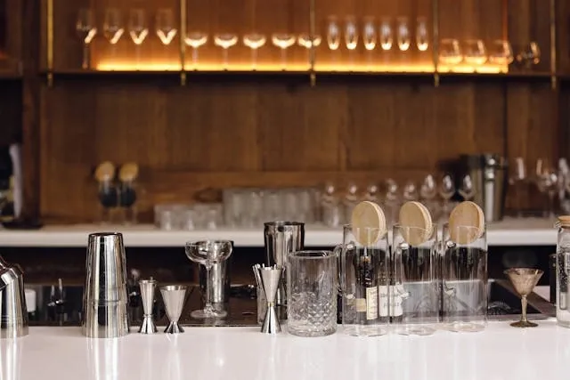 various bar tools on a countertop for essential bar tools various bar tools on a countertop for essential bar tools