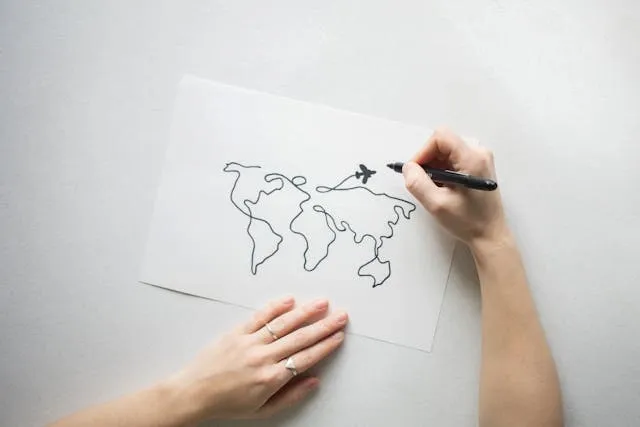 a person drawing on paper for can you bring a pen on a plane a person drawing on paper for can you bring a pen on a plane