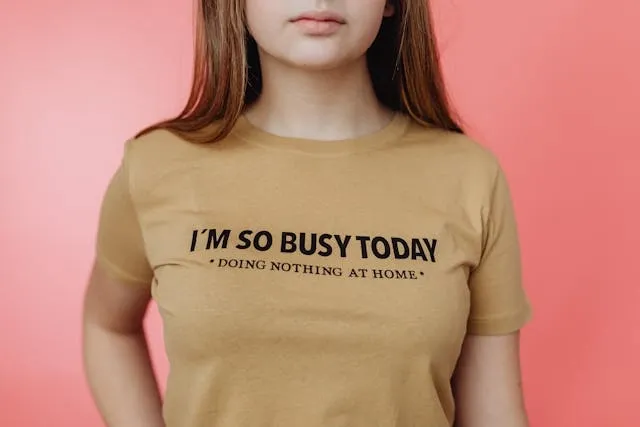 a t-shirt with a text print for heat transfer vs embroidery a t-shirt with a text print for heat transfer vs embroidery