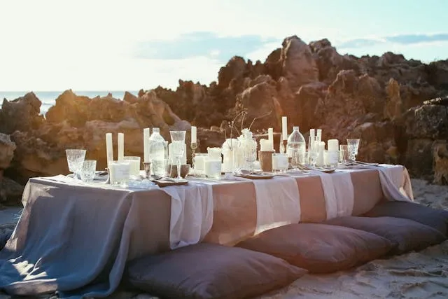 a reception table among rocks for dining table decor ideas