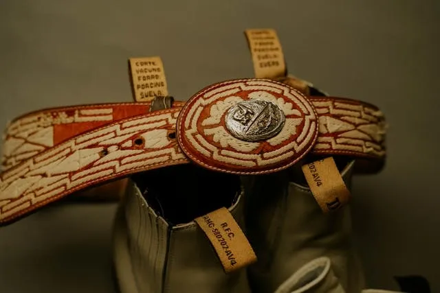 a traditional mexican leather belt for what are belt buckles made of
