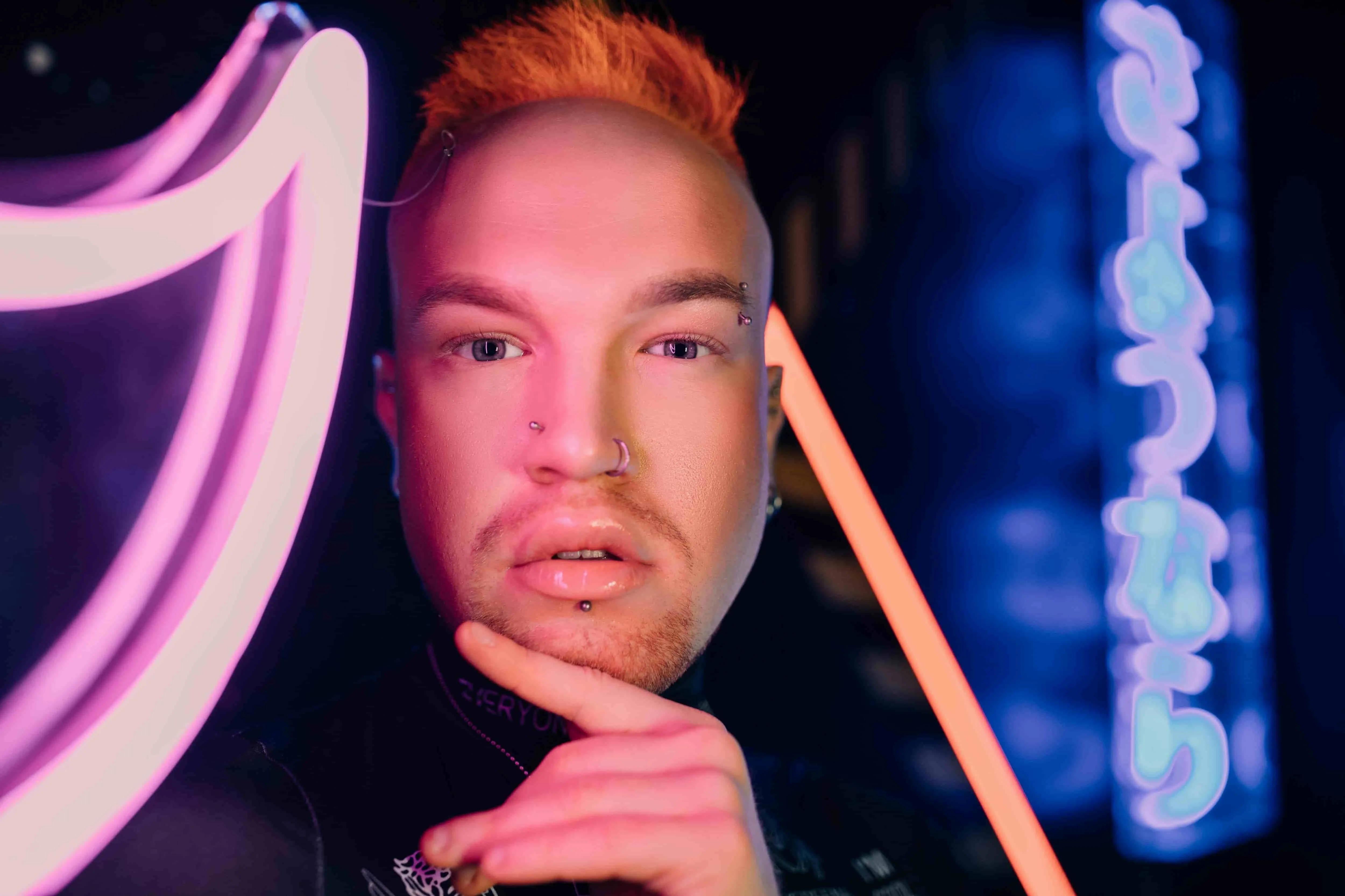 close-up of a man with piercings for neon light portraits