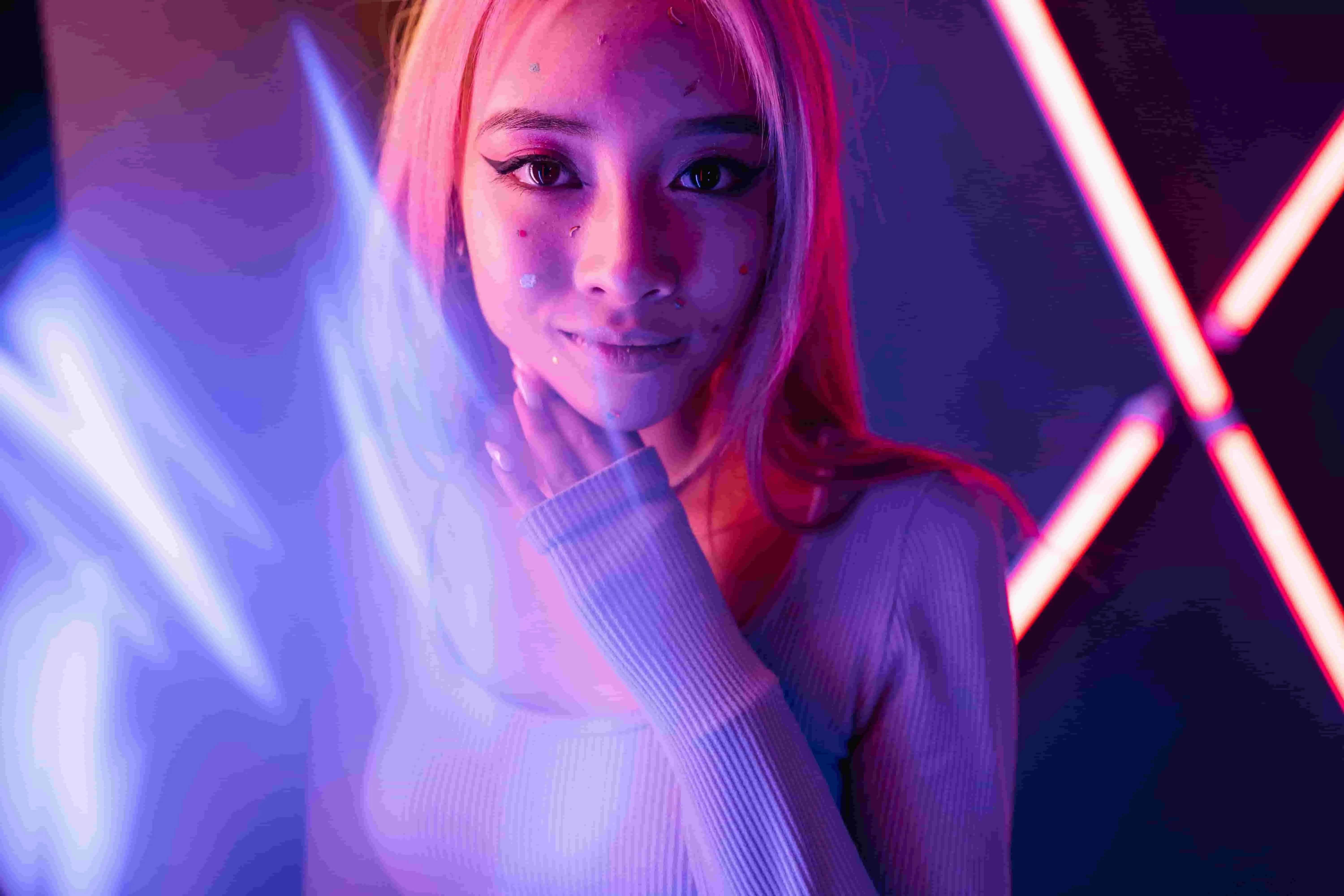 a woman with pink hair for neon light portraits
