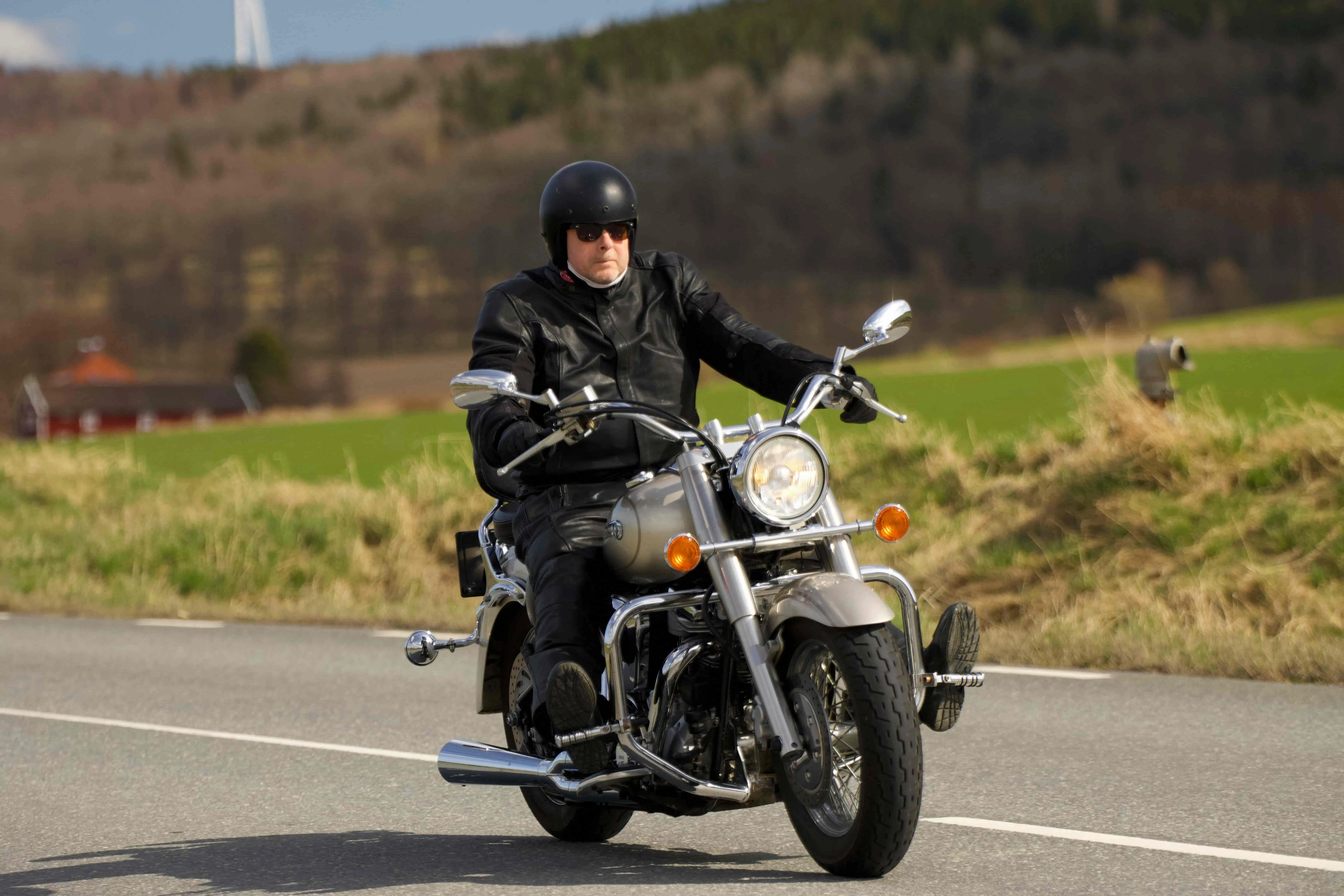 a man riding a motorcycle for hells angels patches meaning