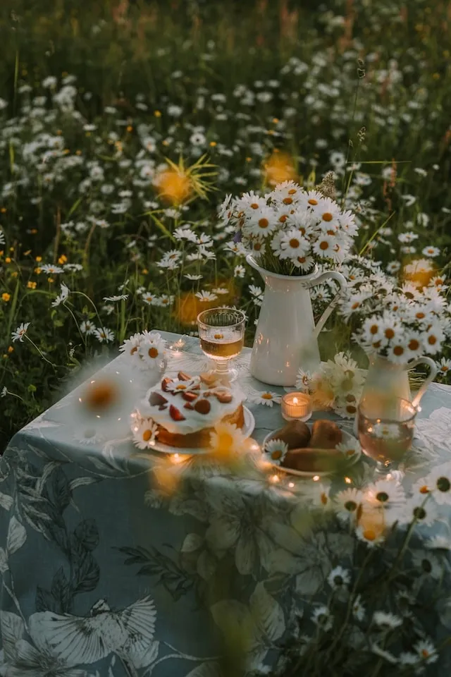 Floral outdoor table setting for how to keep tablecloths from blowing away