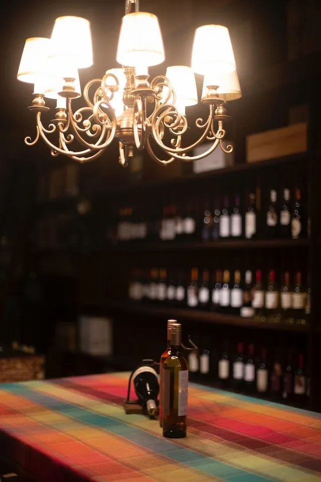 A colorful tablecloth in a wine bar for tablecloth sizes