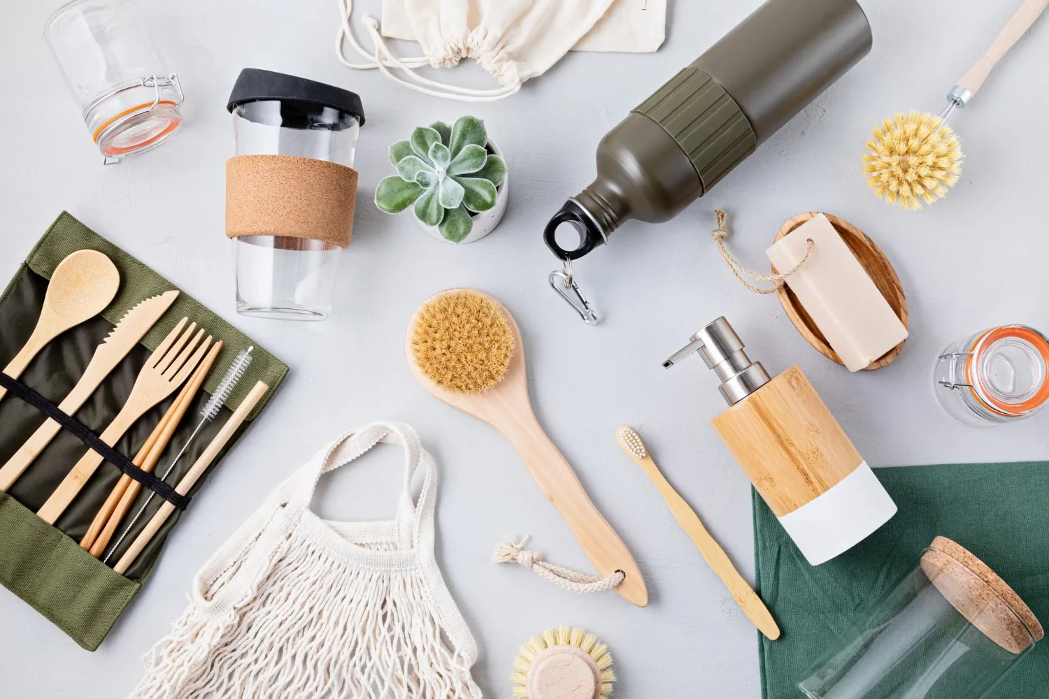 Set of eco friendly bamboo cutlery, mesh cotton bag, reusable coffee tumbler