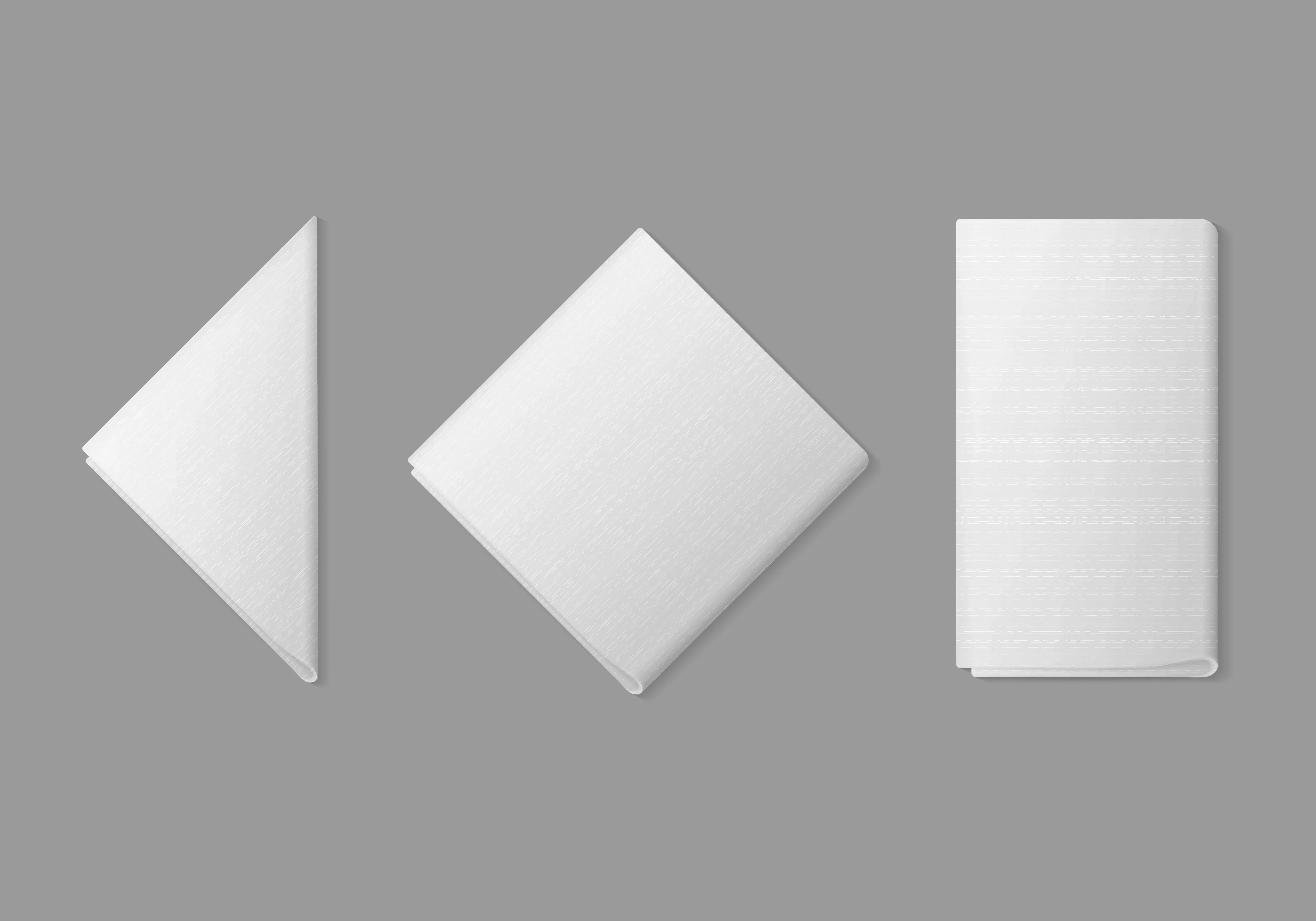 Set of white folded square rectangular triangular napkins top view on background