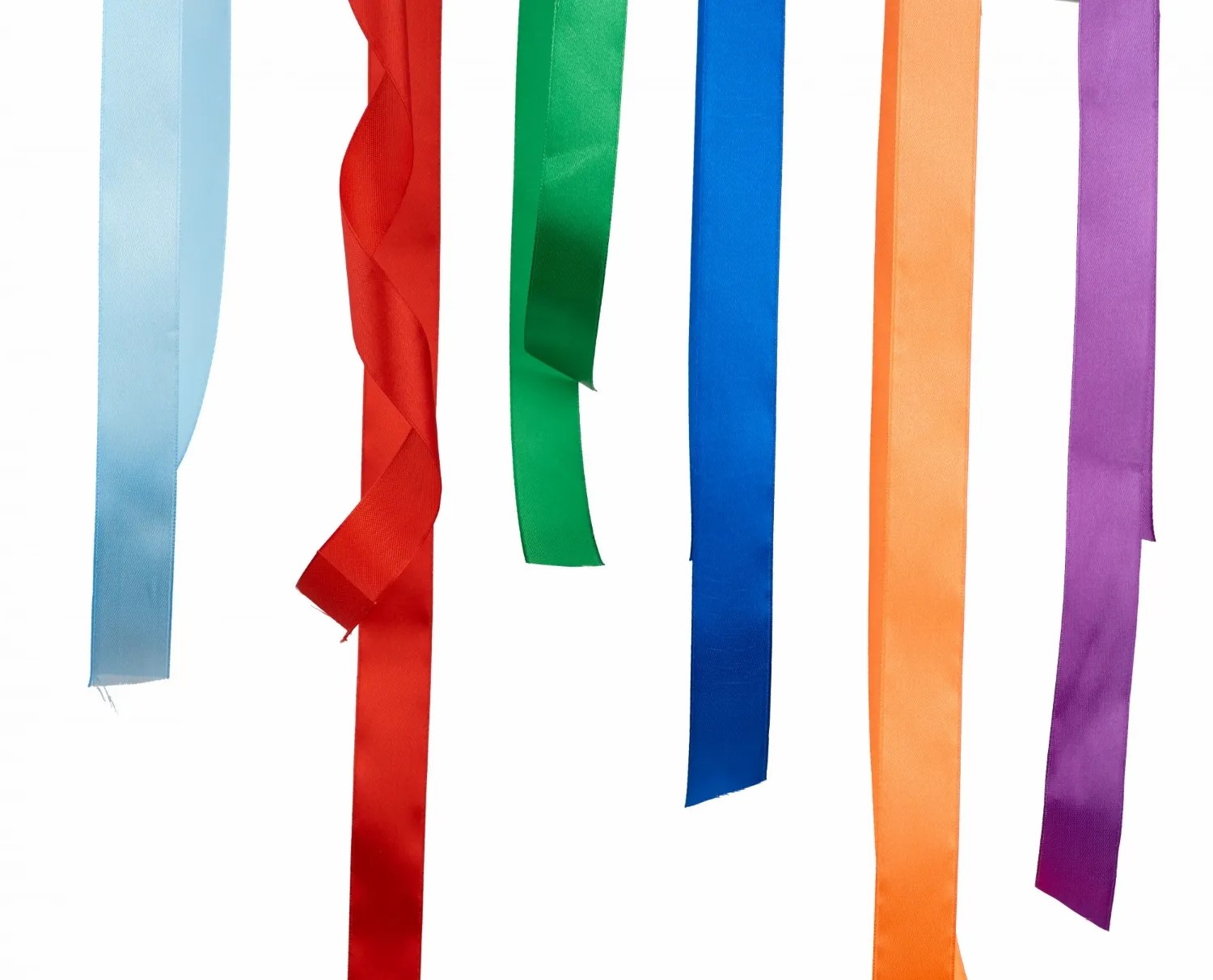 Multicolored silk ribbons isolated on white