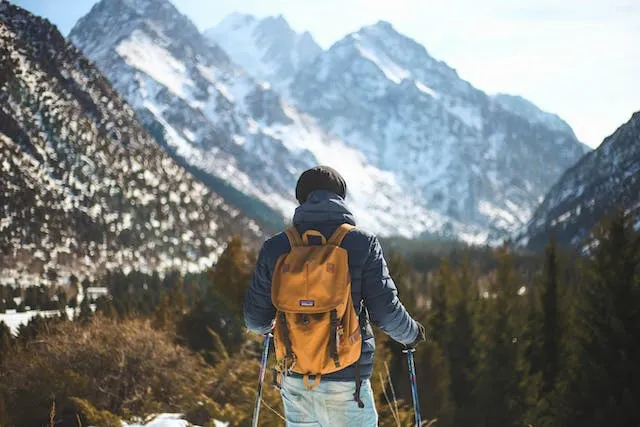 a man with a backpack ready to hike for patches on backpack