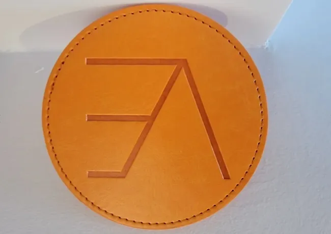 a leather coaster for cool beer coasters