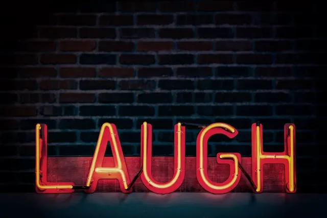 a neon sign that says laugh for are neon signs a fire hazard