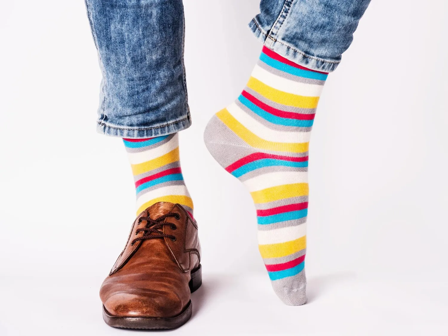 Men's legs trendy shoes and bright socks