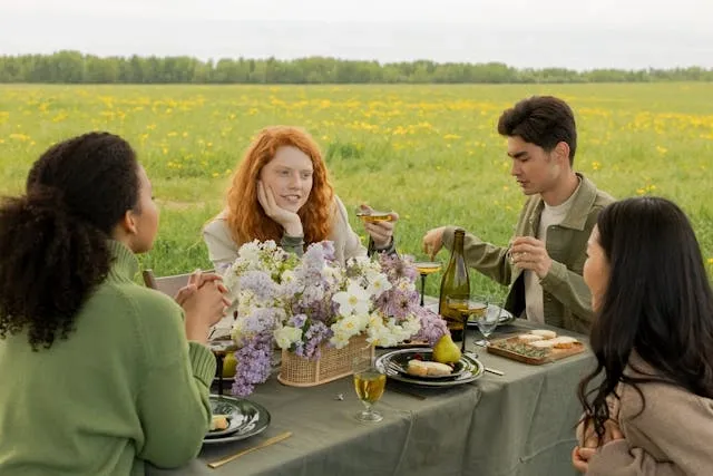 a group of people dining al fresco for picnic table size tablecloth