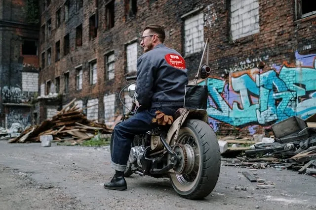 a biker wearing a patched leather jacket for patches on a leather jacket