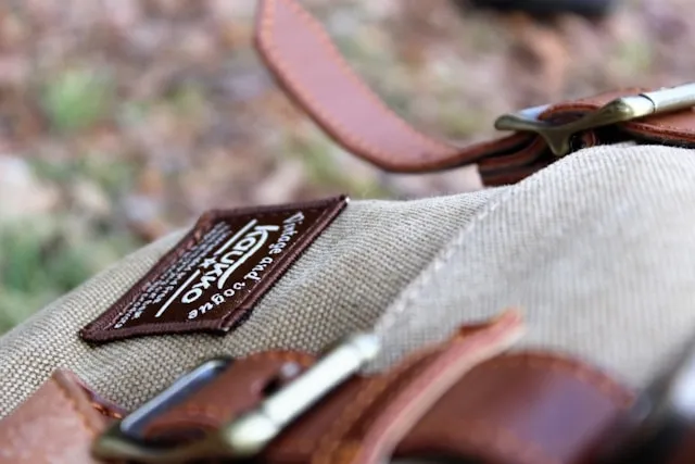 a backpack with a patch on it for how to sew a patch on a backpack