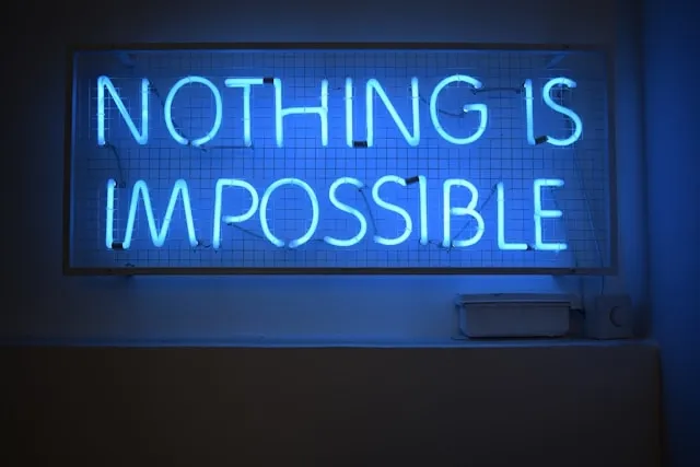 a blue nothing is impossible neon sign for how do neon lights work