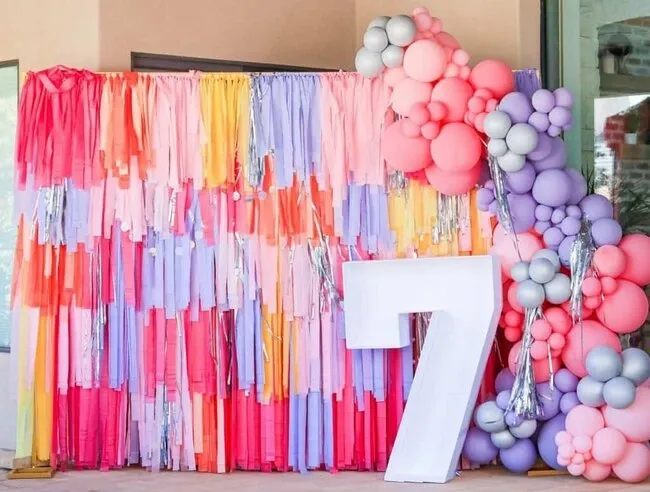 a beautiful fringe backdrop for tablecloth backdrop diy