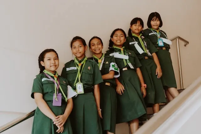 a group of girl scouts for how to iron on girl scout patches