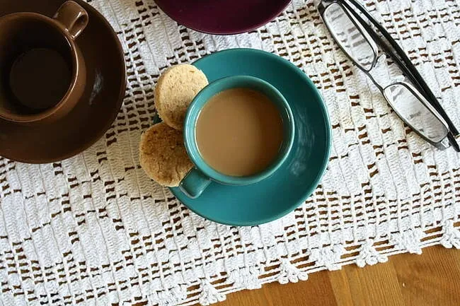 coffee and glasses on a table cover for coffee table cover ideas