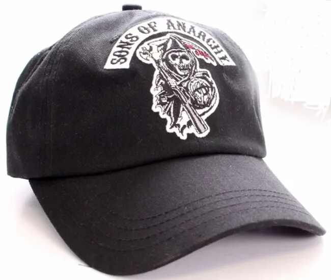 a black baseball cap with a custom patch for can you use a heat press for iron-on patches