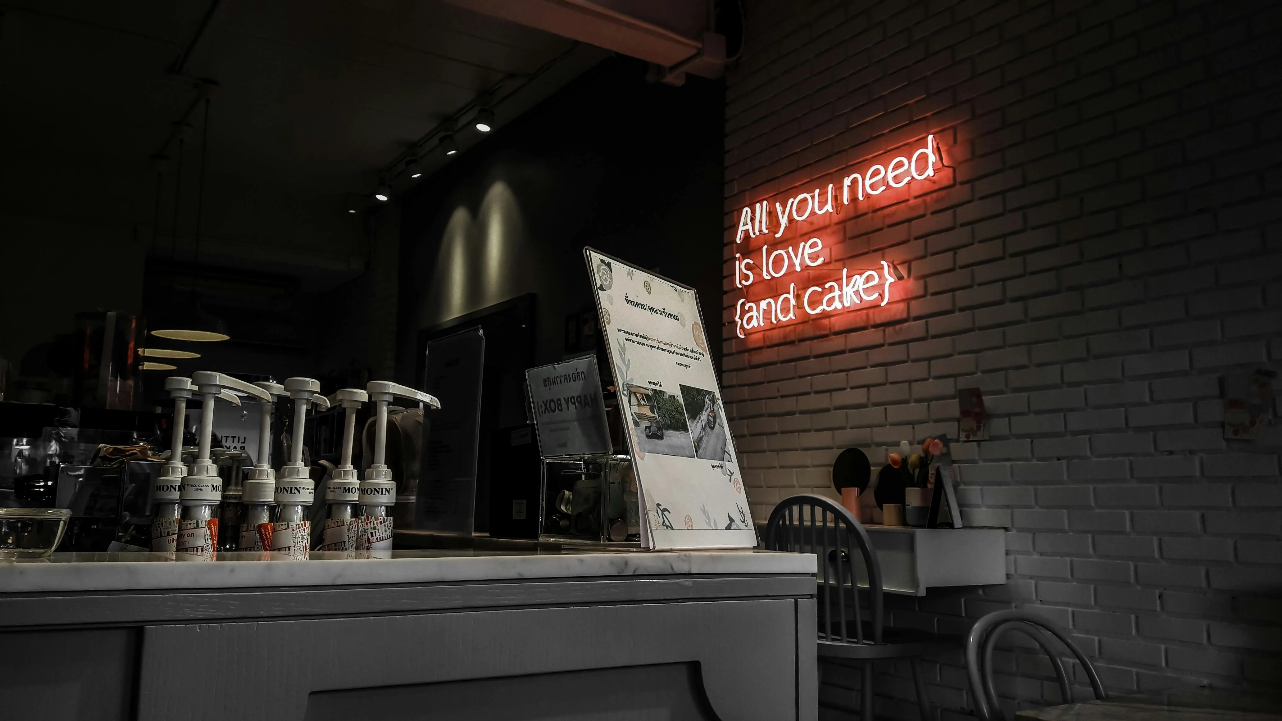 a whimsical neon sign in a cafe for are neon lights bad for the environment