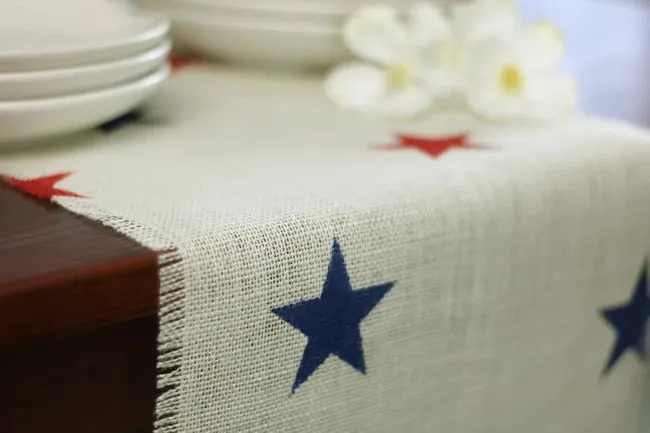 a table runner hanging over the table edge for table runner too long