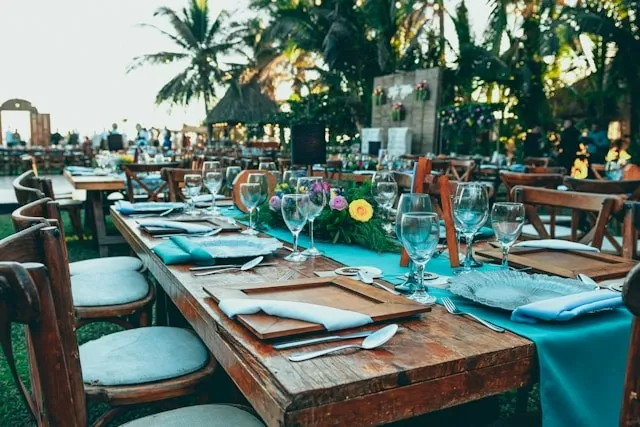 dining tables in an outdoor setting for table set up for events