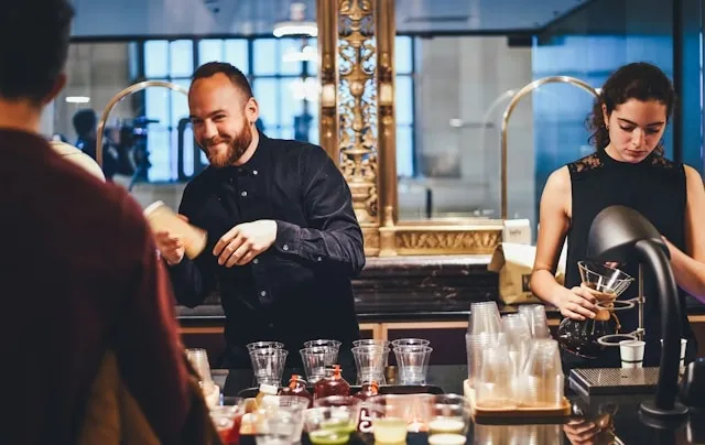 bartenders at work for bar equipment list