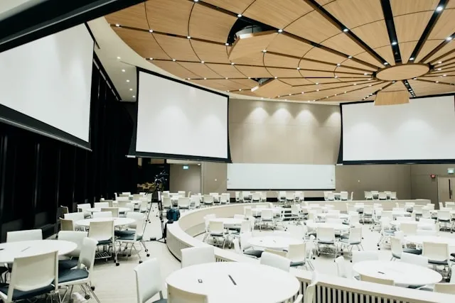 a large conference room ready for an event for corporate event planning checklist