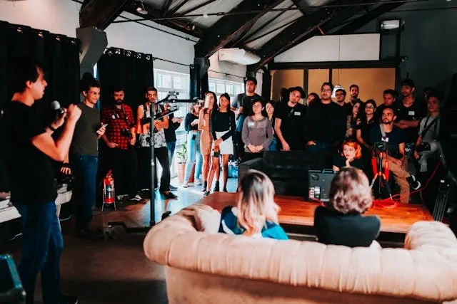 a group of people enjoying the entertainment at a formal event for event planning tips