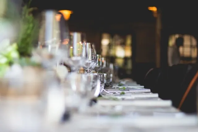 a well-prepared banquet table at a grand event for gala event planning checklist